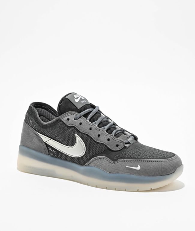 gray and black nike shoes
